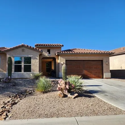 Buy this 4 bed house on West Whispering Windmill Lane in Marana, AZ