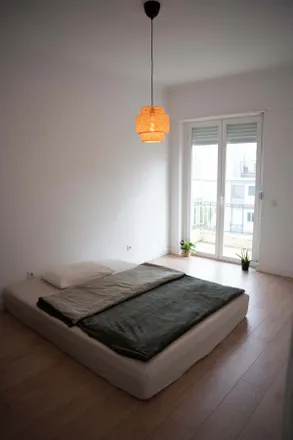 Rent this 2 bed room on Rua Martins Barata in 1400-035 Lisbon, Portugal