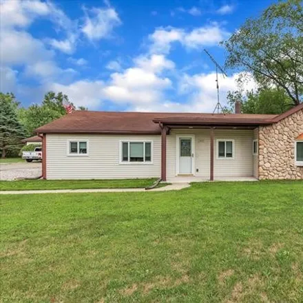 Buy this 4 bed house on 500 North Burkhart Road in Howell Township, Livingston County