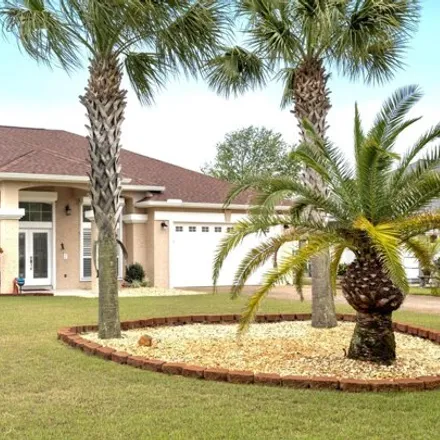 Buy this 4 bed house on 143 Grand Heron Drive in Edgewater Gulf Beach, Panama City Beach