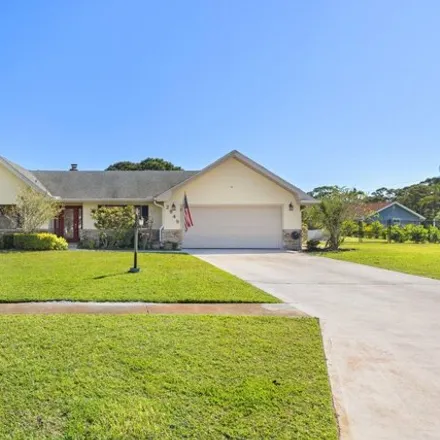 Buy this 3 bed house on 2847 Southeast Ginza Street in Port Saint Lucie, FL 34952