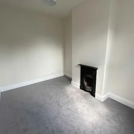 Rent this 2 bed townhouse on Stamford Park Road in Altrincham, WA15 9ER
