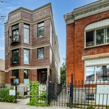 Buy this 2 bed house on 1410 North Campbell Avenue in Chicago, IL 60647