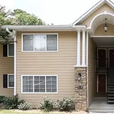 Rent this 2 bed condo on 1100 Regency Woods Drive in Brookhaven, GA 30319