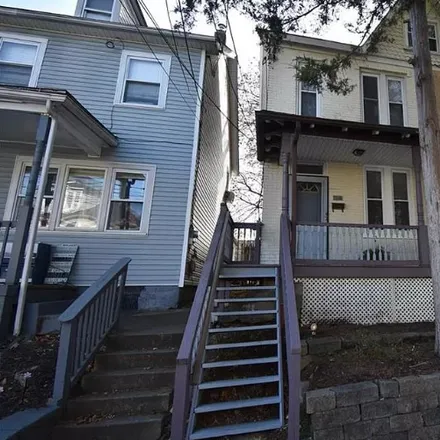 Rent this 3 bed house on 1040 W Wilkes Barre St