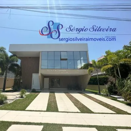 Buy this 4 bed house on Alphaville Fortaleza Clube in Avenida Litorânea, Cararu