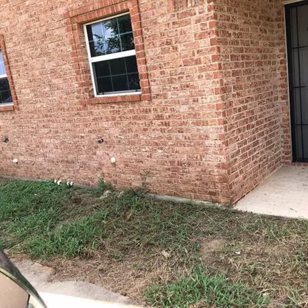 Rent this 3 bed house on 1416 East Mulkey Street in Fort Worth, TX 76104