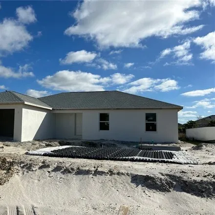 Buy this 4 bed house on 2117 Northwest 2nd Avenue in Cape Coral, FL 33993