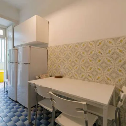 Rent this 6 bed apartment on Rua Marquês Sá da Bandeira 100 in 1050-150 Lisbon, Portugal