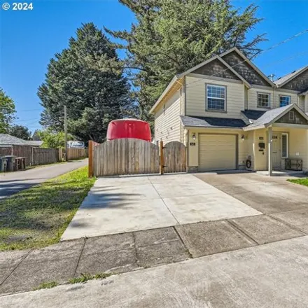 Buy this 3 bed townhouse on 545 Northeast 2nd Avenue in Hillsboro, OR 97124