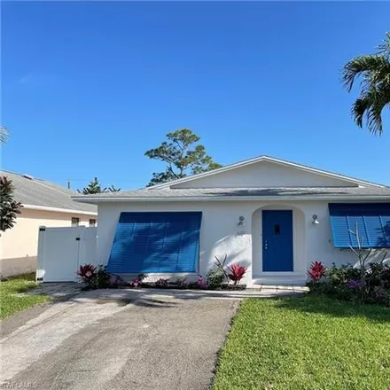 Rent this 4 bed house on 647 109th Avenue North in Collier County, FL 34108