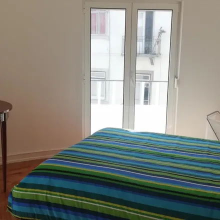 Rent this 4 bed apartment on Rua Tomás Cabreira in 1600-069 Lisbon, Portugal