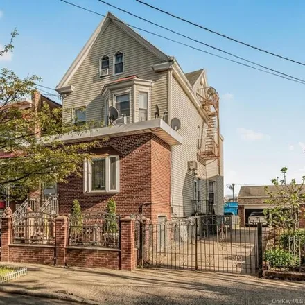 Buy this 7 bed house on 2516 Poplar Street in New York, NY 10461