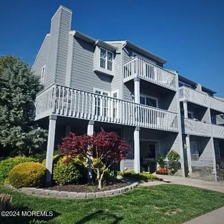 Buy this 2 bed townhouse on 299 Spinnaker Way in Neptune Township, NJ 07753