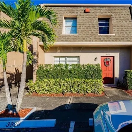 Buy this 4 bed townhouse on 3404 Quail Close in Pompano Beach, FL 33064