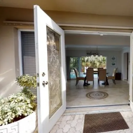 Rent this 4 bed apartment on 3320 Northeast 18Th Ter in Coral Woods, Oakland Park