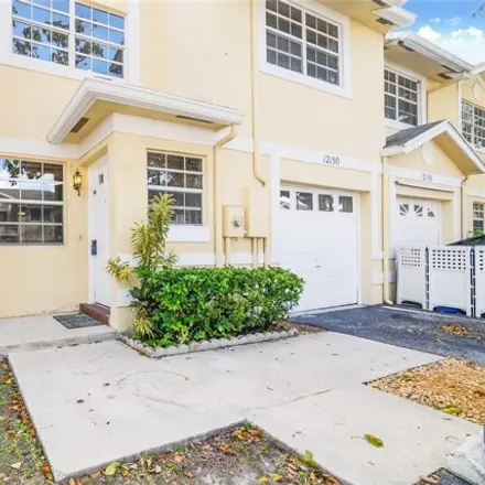Rent this 3 bed townhouse on 12124 Southwest 50th Street in Cooper City, FL 33330