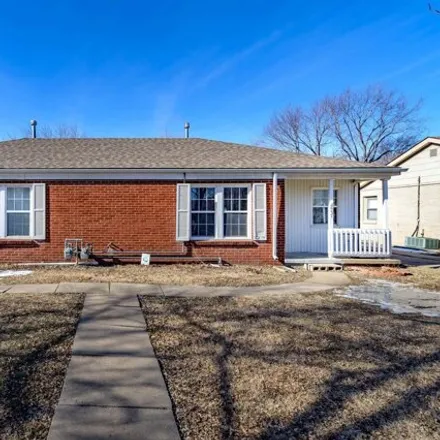 Buy this 4 bed house on 1959 Garland Street in Wichita, KS 67203