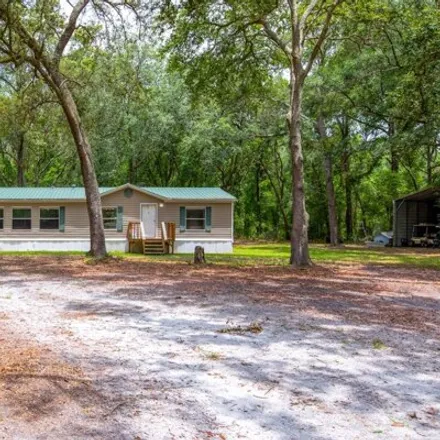 Buy this studio apartment on 94th Street in Suwannee County, FL 32060