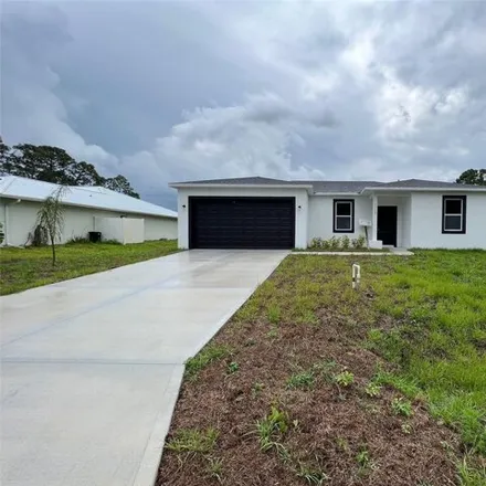 Rent this 4 bed house on 482 Tobias Street Southeast in Palm Bay, FL 32909