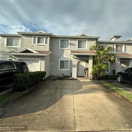 Rent this 3 bed townhouse on 4649 Southwest 14th Street in Lakeview, Deerfield Beach