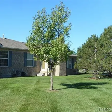 Buy this 2 bed condo on 50496 Spencer Court in Macomb Township, MI 48044