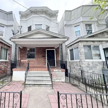 Buy this 5 bed house on 88-29 86th Street in New York, NY 11421