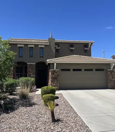 Rent this 4 bed house on 31074 North 137th Avenue in Peoria, AZ 85383
