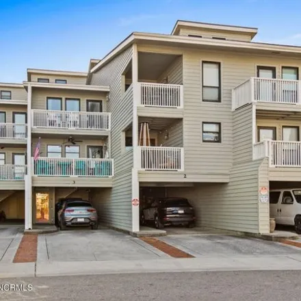 Buy this 2 bed townhouse on Sandpeddler Inn & Suites in 15 South Lumina Avenue, Wrightsville Beach