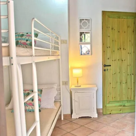 Rent this 3 bed townhouse on 09010 Pula Casteddu/Cagliari
