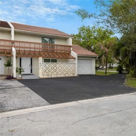 Buy this 3 bed townhouse on 2912 Northwest 116th Terrace in Coral Springs, FL 33065