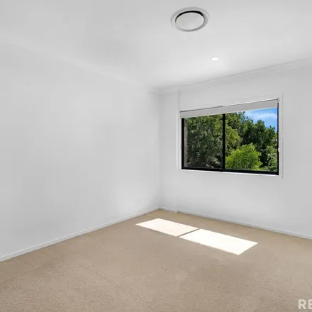 Rent this 4 bed townhouse on Somerset Reserve in Gill Court, Mudgeeraba QLD 4230