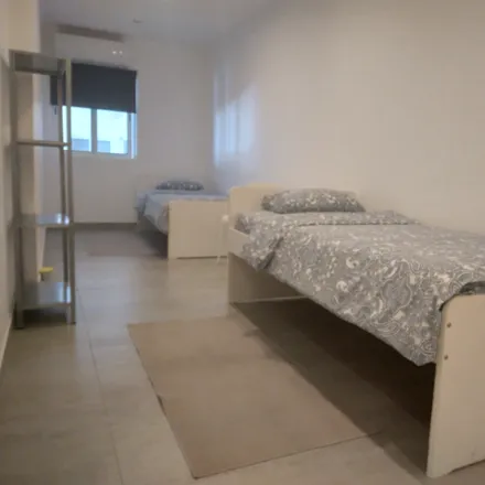 Rent this 1 bed room on Rua de Serafim Martins in 2829-506 Costa da Caparica, Portugal