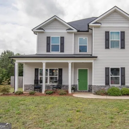 Buy this 4 bed house on 299 Dixon Circle in Spalding County, GA 30292