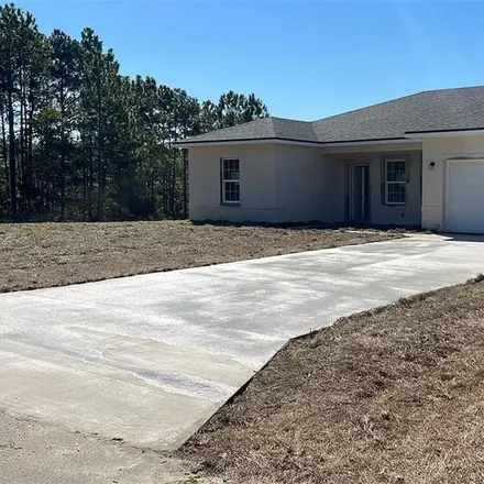 Buy this 4 bed house on 11201 Southwest 138th Place in Marion County, FL 34473
