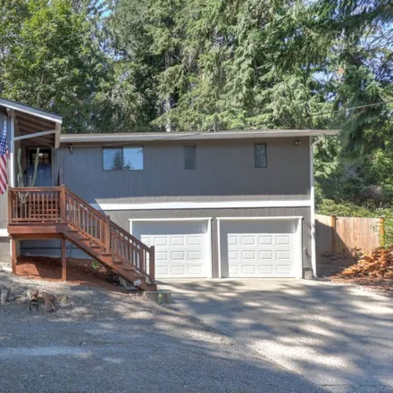Buy this 4 bed house on 15039 206th Avenue Southeast in Maple Hills, Renton