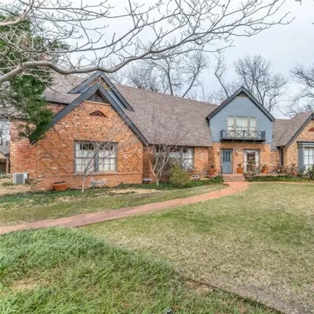 Buy this 5 bed house on 6043 Walnut Hill Circle in Dallas, TX 75230
