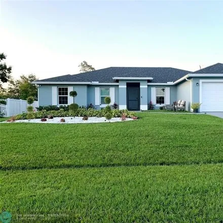 Buy this 4 bed house on 232 Southwest Starfish Avenue in Port Saint Lucie, FL 34984