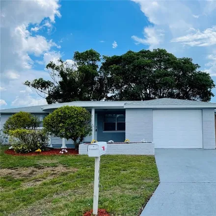Buy this 3 bed house on 3446 Trask Drive in Holiday, FL 34691