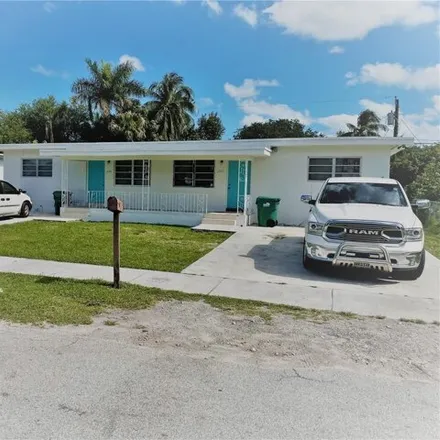 Rent this 2 bed house on 1340 NW 102nd St Unit 1342 in Miami, Florida