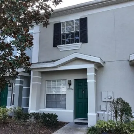 Buy this 2 bed townhouse on Heron Pointe Drive in Orange County, FL