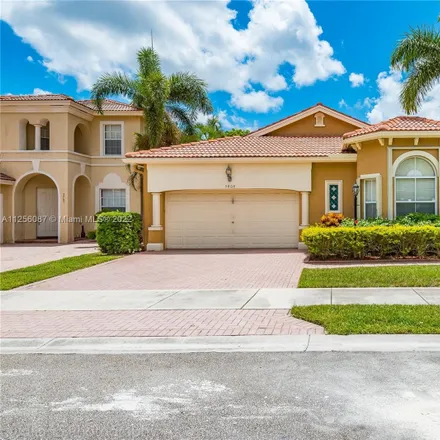 Rent this 3 bed house on 5808 Northwest 121st Avenue in Heron Bay South, Coral Springs