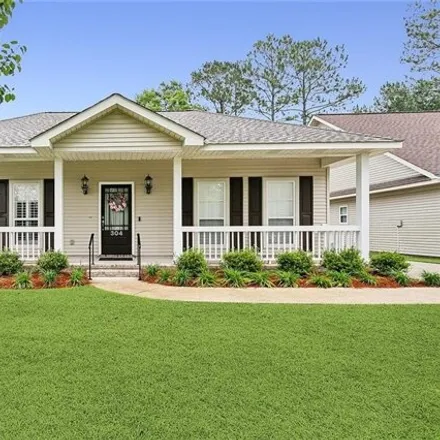 Buy this 3 bed house on 324 Carriage Pines Lane in Covington, LA 70435