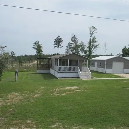 Buy this 1 bed house on 258 Magnolia Cove in Polk County, TX 77360