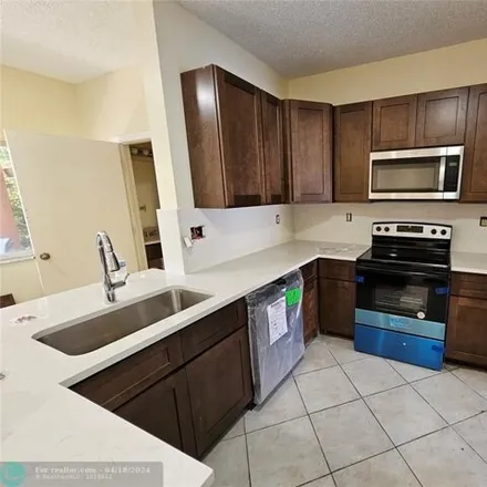Rent this 3 bed house on Southwest 102nd Way in Miramar, FL 33025