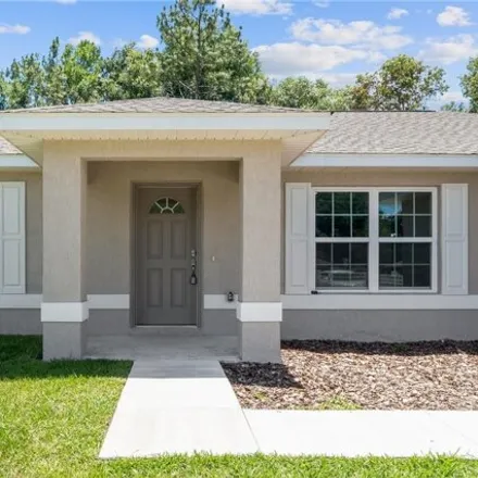 Rent this 3 bed house on 5646 Pecan Road in Marion County, FL 34472