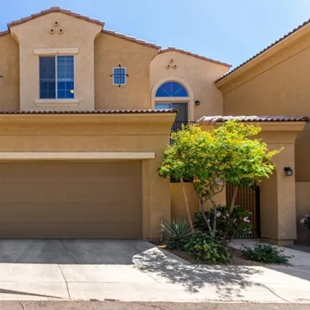 Rent this 4 bed townhouse on West Milano Avenue in Mesa, AZ 85210