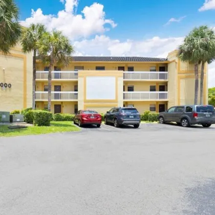 Rent this 3 bed apartment on Northwest 28th Drive in Coral Springs, FL 33065