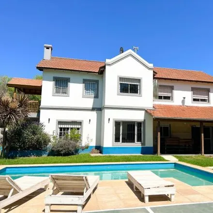 Rent this 6 bed house on Chile in La Lonja, B1631 BUI Buenos Aires