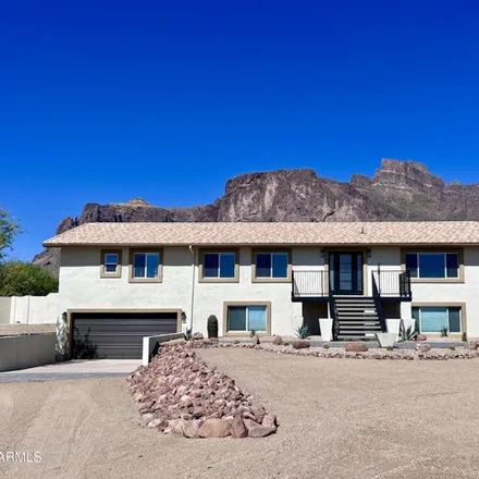 Buy this 4 bed house on 5770 E Roundup St in Apache Junction, Arizona